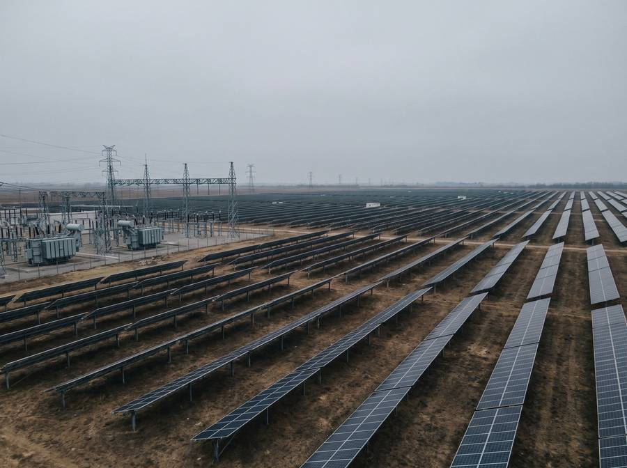 Utility-scale solar array with its connecting substation